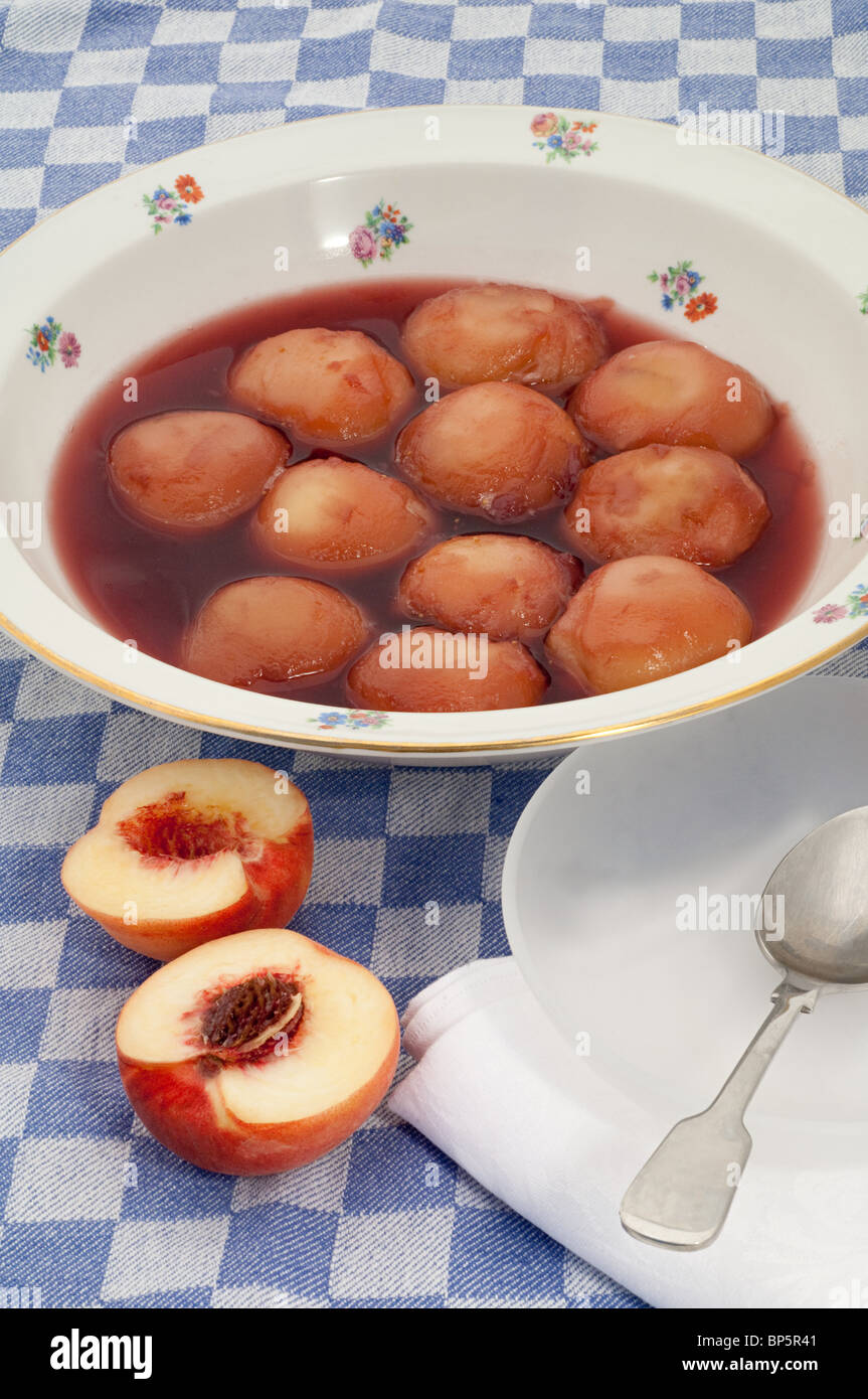 Peaches in syrup Stock Photo Alamy