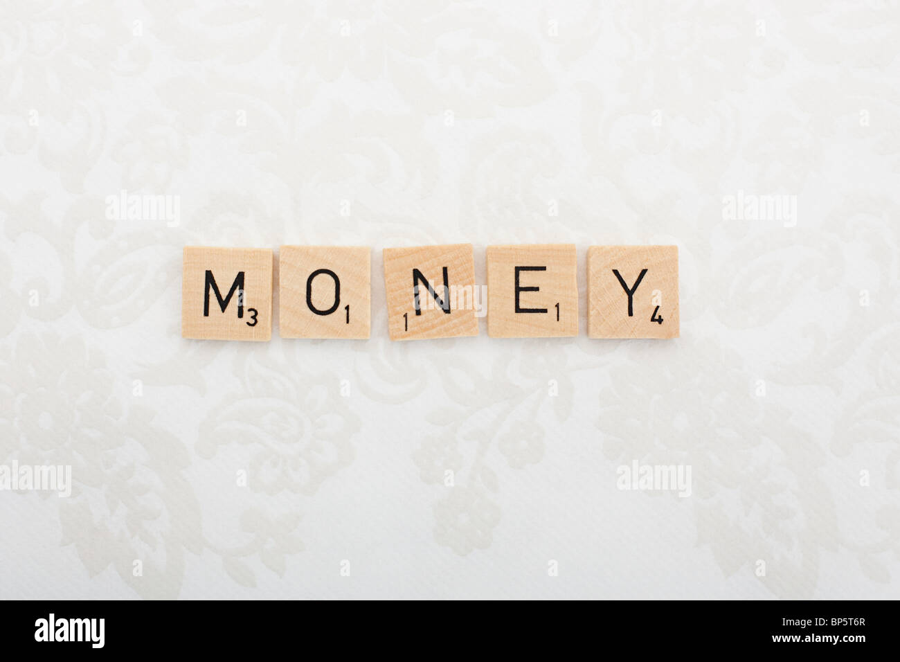 Game tile letters spelling money Stock Photo Alamy