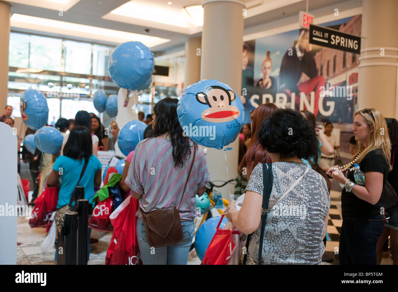 Shoppers at the JCPenney store in New York participate in a Paul Frank and  Julius back-to-school promotion Stock Photo - Alamy