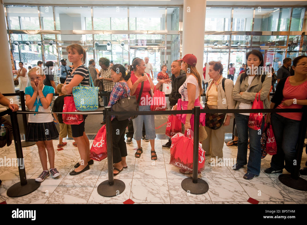 Shoppers at the JCPenney store in New York participate in a Paul Frank and  Julius back-to-school promotion Stock Photo - Alamy