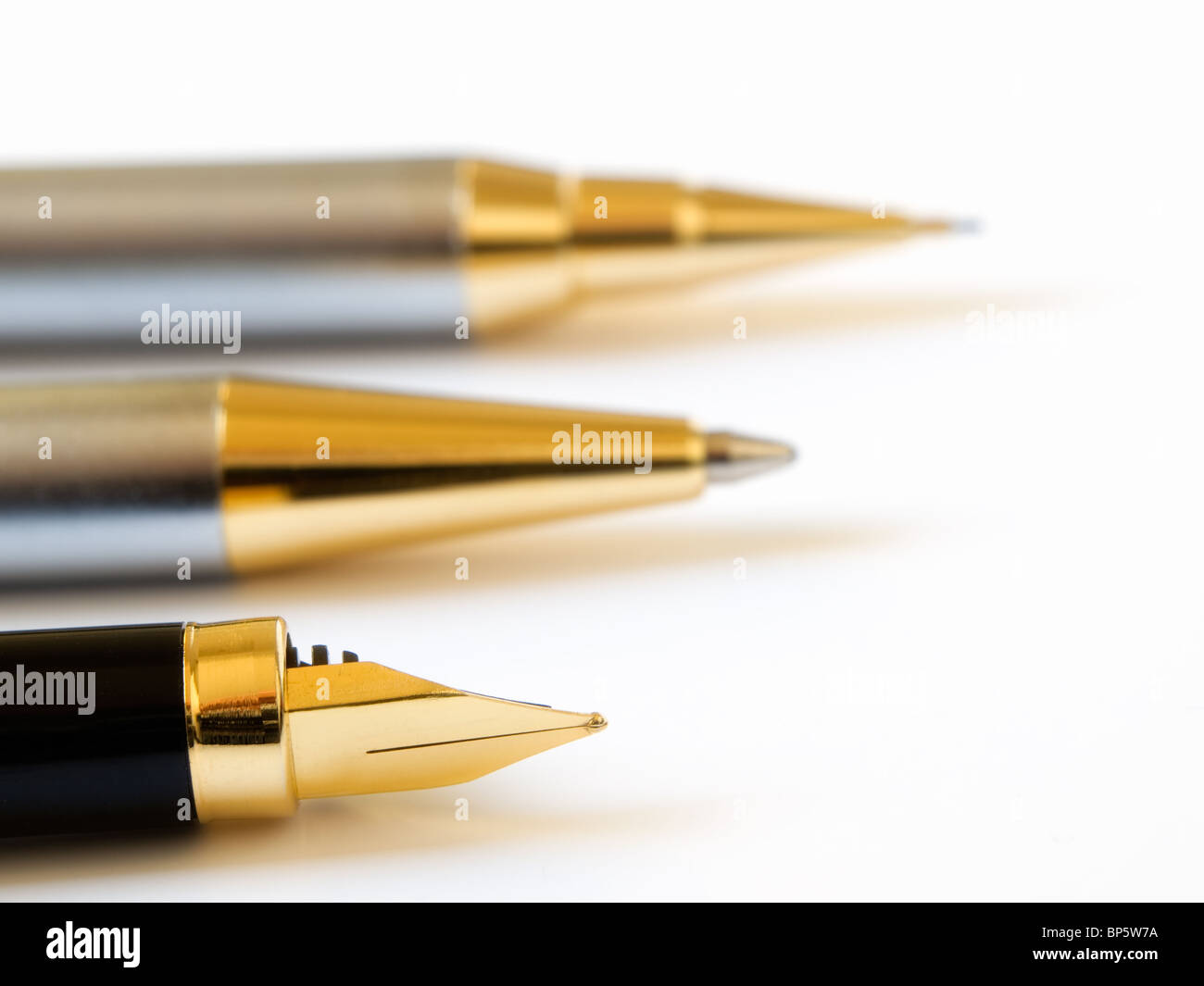 Three types of writing equipment on a bright background Stock Photo Alamy