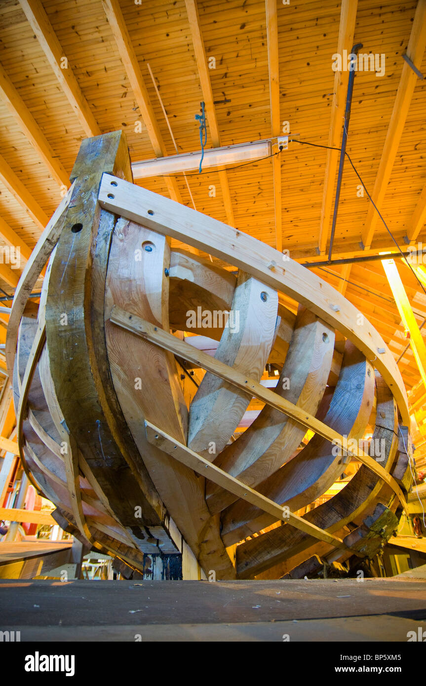 Wooden boat during construction using traditional wooden techniques at