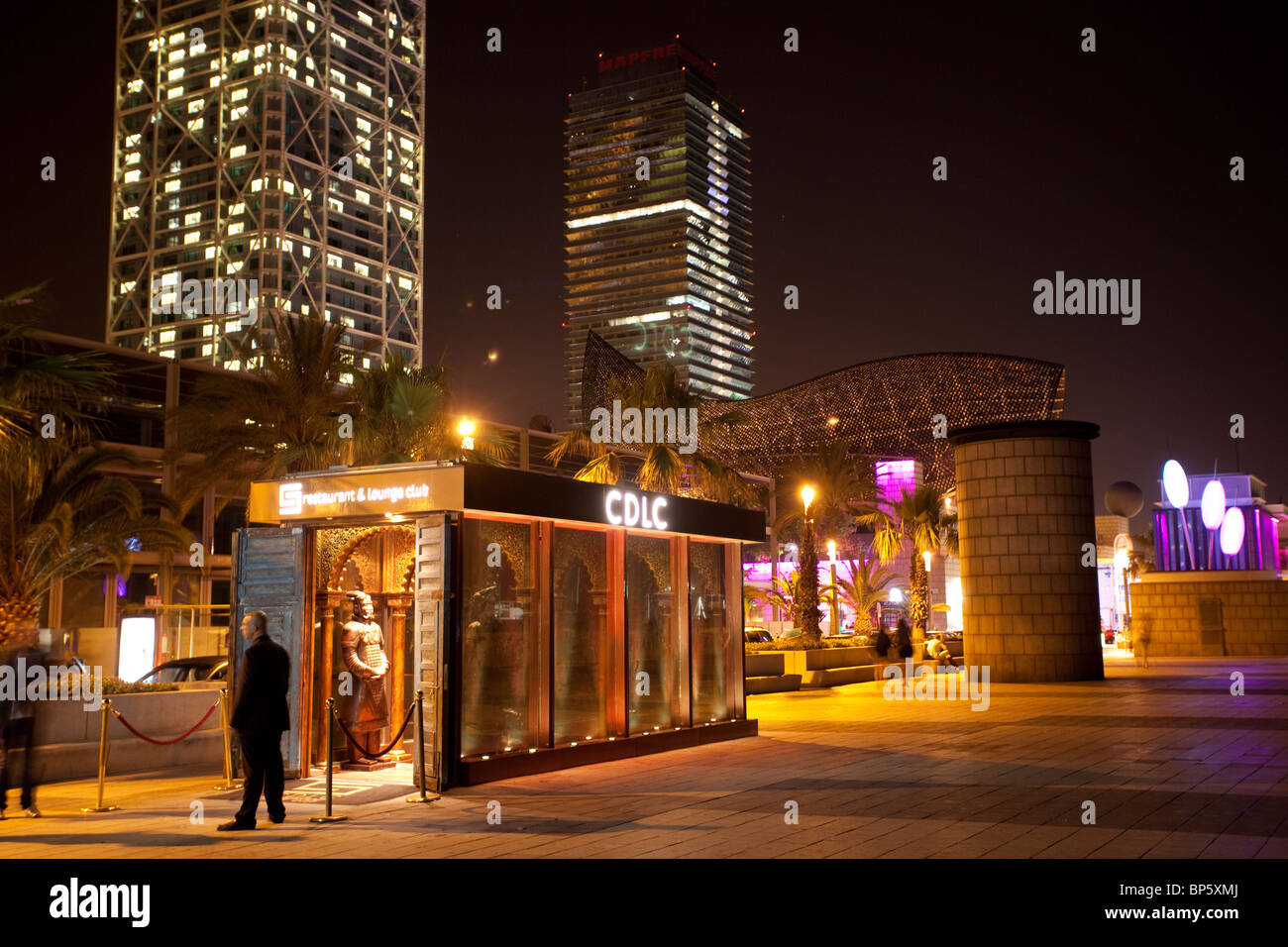 Barcelona CDLC exterior by night with Hotel Arts in the background Stock Photo