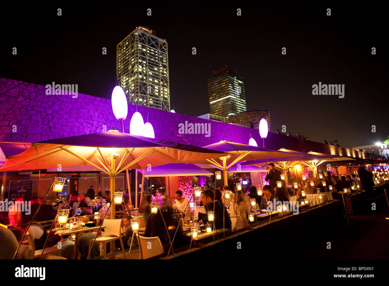 Barcelona trendy looking bars along the beach with Hotel Arts on the left Stock Photo
