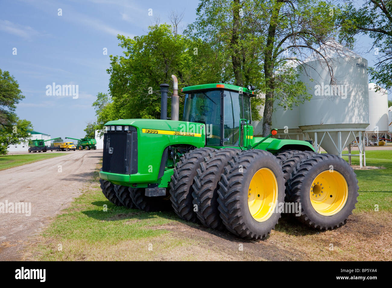 John Deere tractor at the driveway entrance to the Froese farm at Reinfeld, near Winkler, Manitoba, Canada. Stock Photo