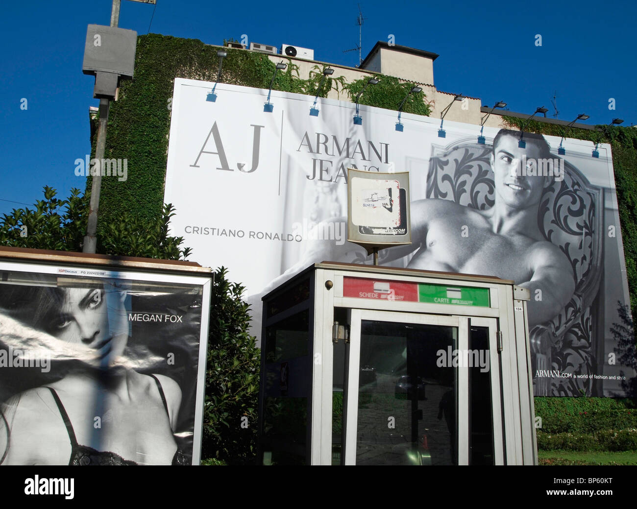 Armani advertising poster of Cristiano Ronaldo and telephone box - Milan - Italy Stock Photo