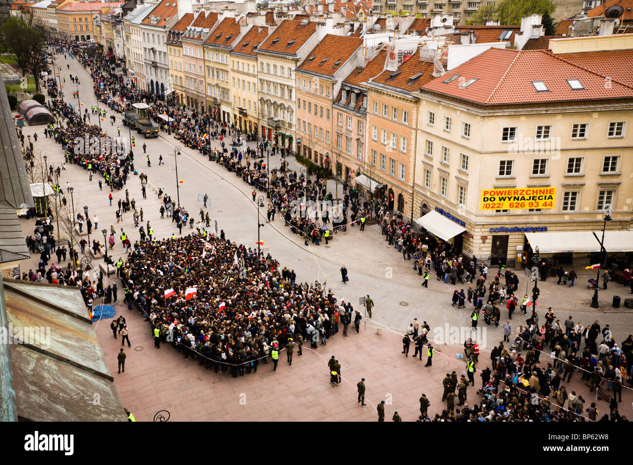 Warsaw Poland: People gather at the Presidential Palace in memory of president Lech Kaczynski and 95 others... Stock Photo