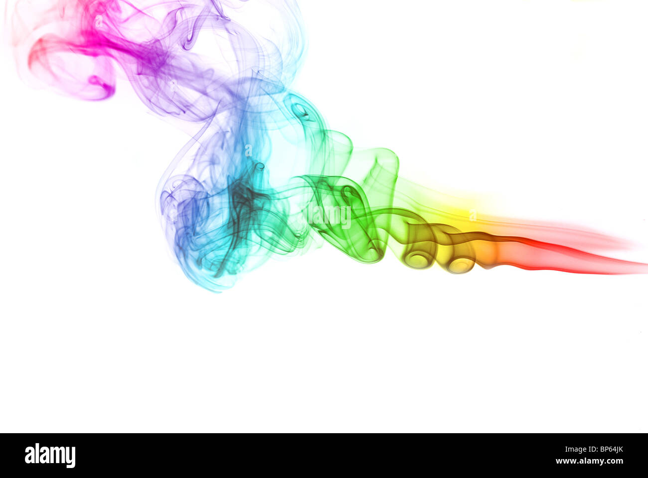 smoke colored moving across the page vivid colors Stock Photo