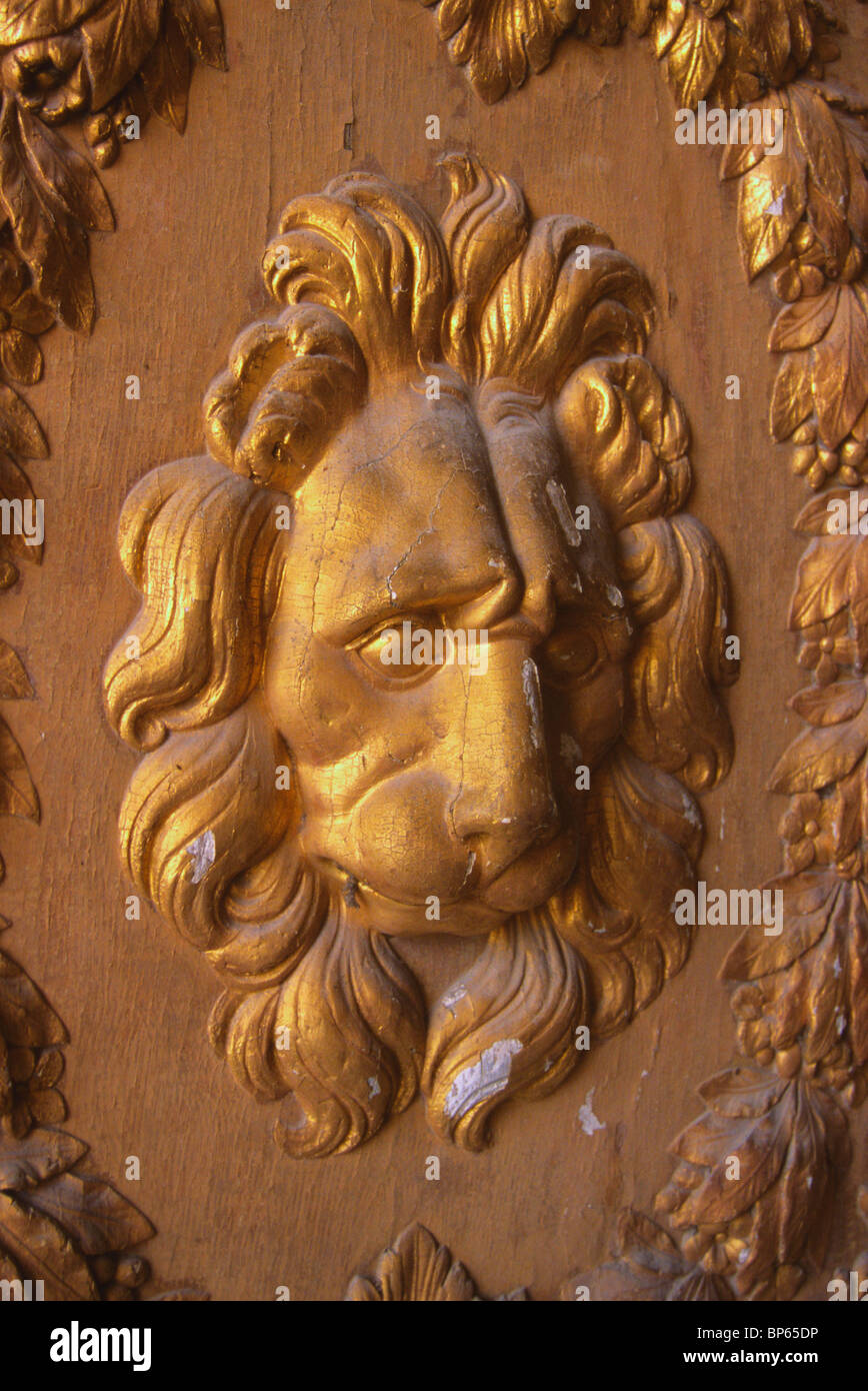 Lion's head on a door, Porte Doree, Chateau de Fontainebleau, Seine-et-Marne, Ile-de-France, France Stock Photo