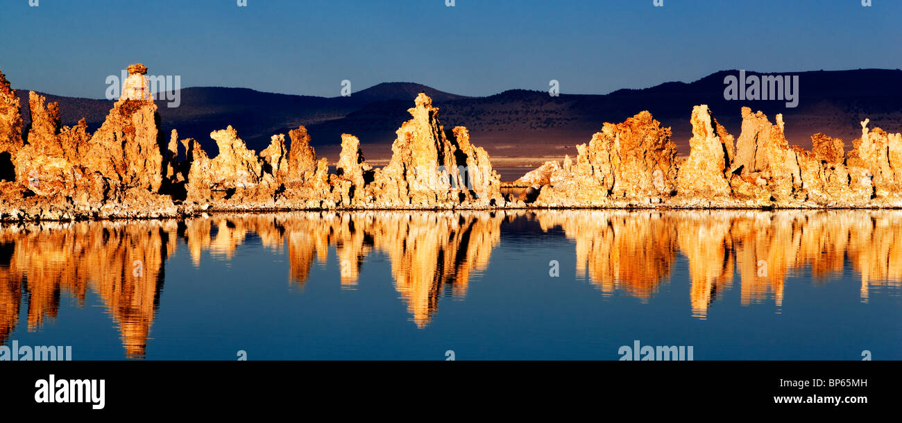 Tufa and reflections in Mono Lake, California Stock Photo
