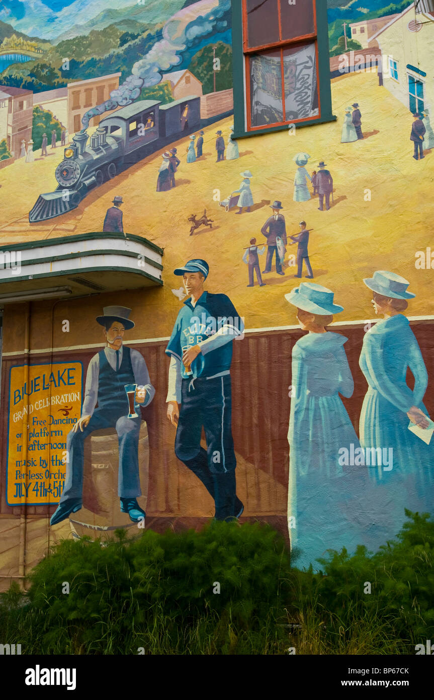 Painted wall mural showing victorian era life in the early 1900's, Blue Lake, Humboldt County, California Stock Photo