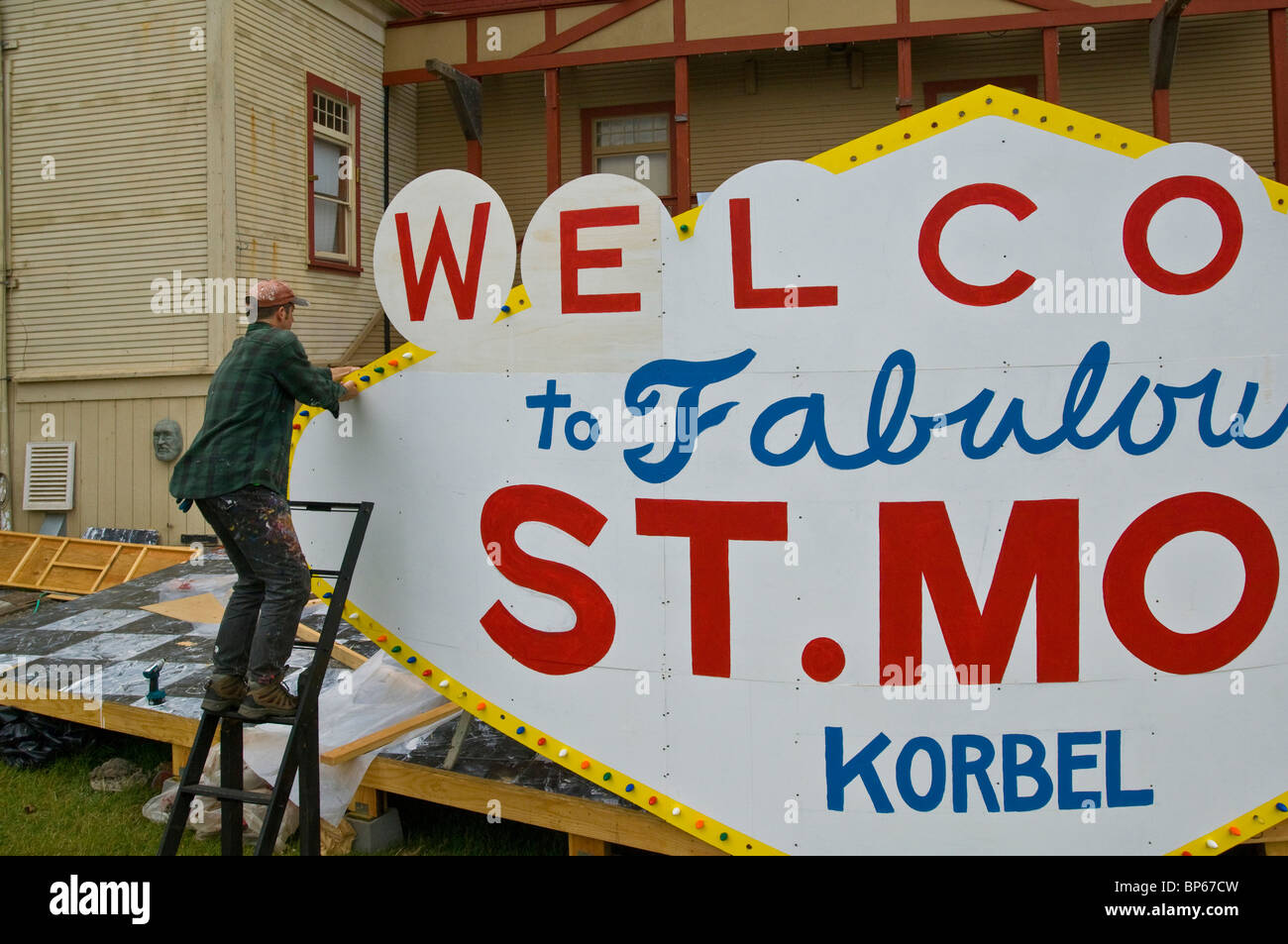 Set Builder constructing a sign for an outdoor stage play at Dell Arte Theater, Blue Lake, California Stock Photo