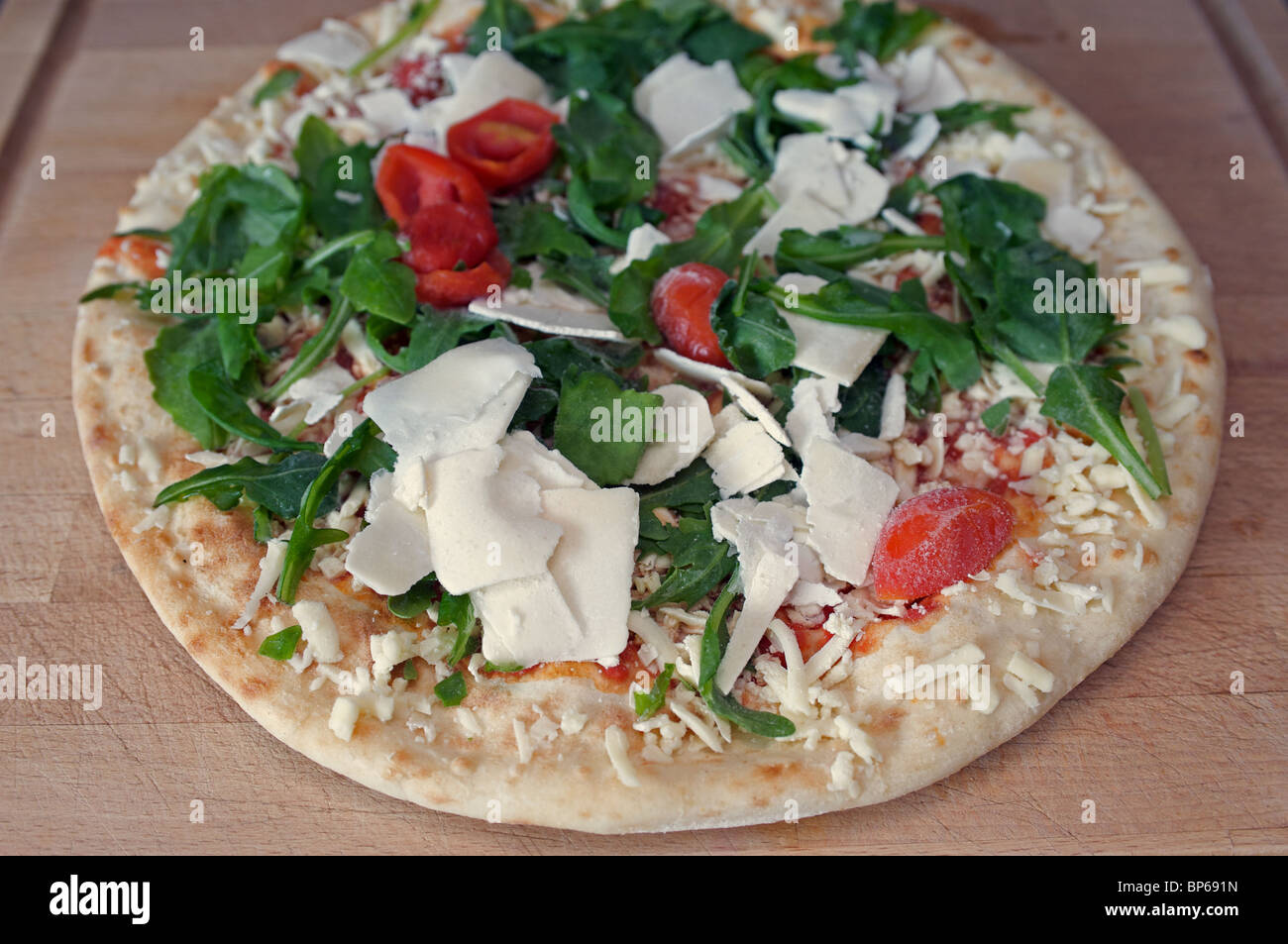 Frozen pizza ready to go into the oven Stock Photo Alamy