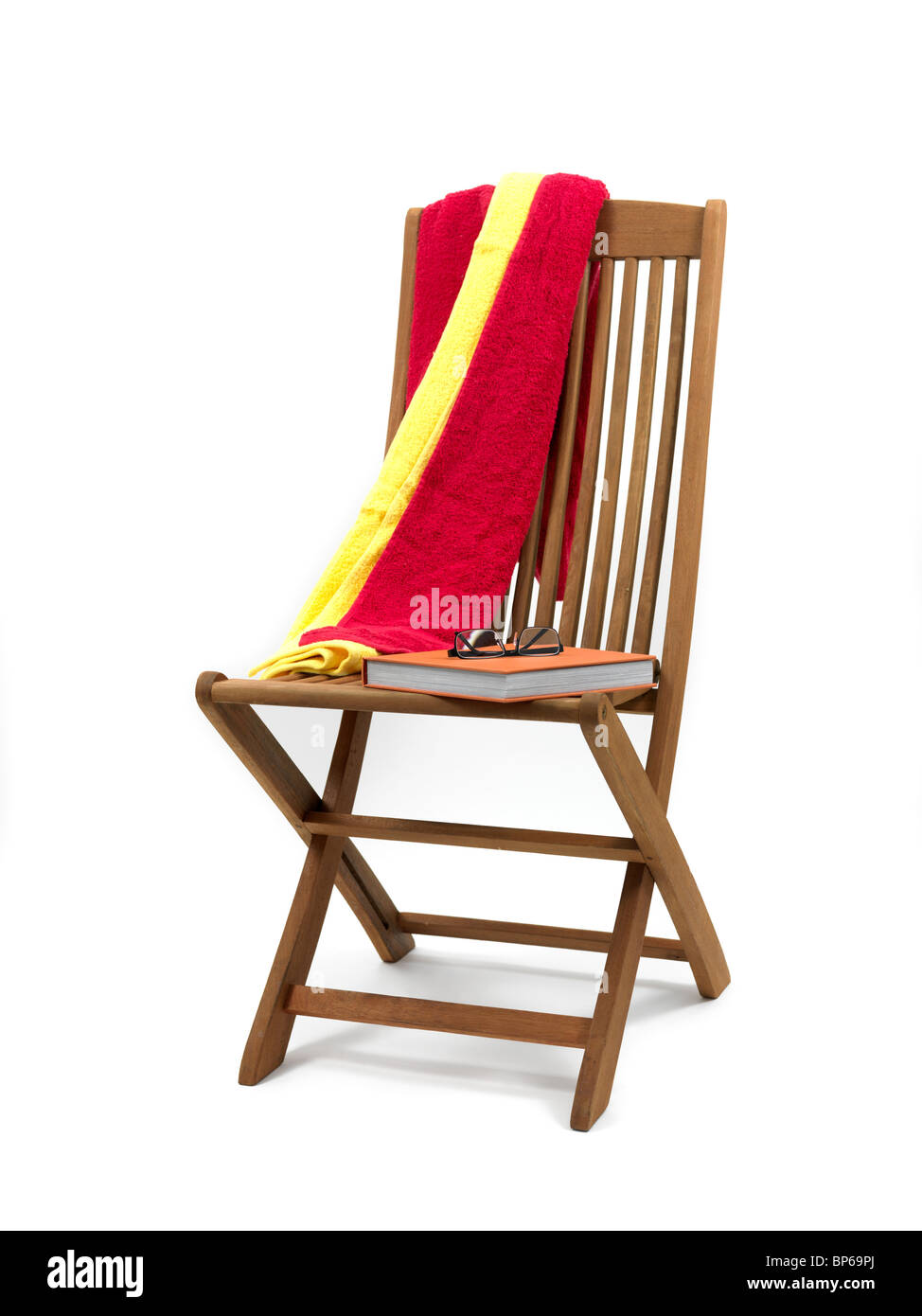 A wooden deck chair isolated against a white background Stock Photo