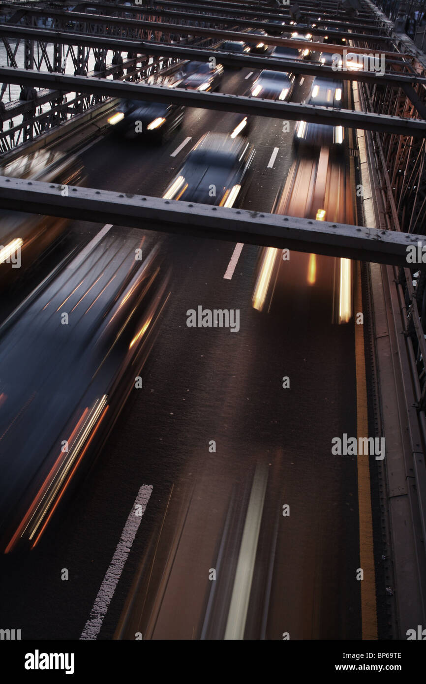 Some cars on the Brooklyn bridge in NYC. Stock Photo