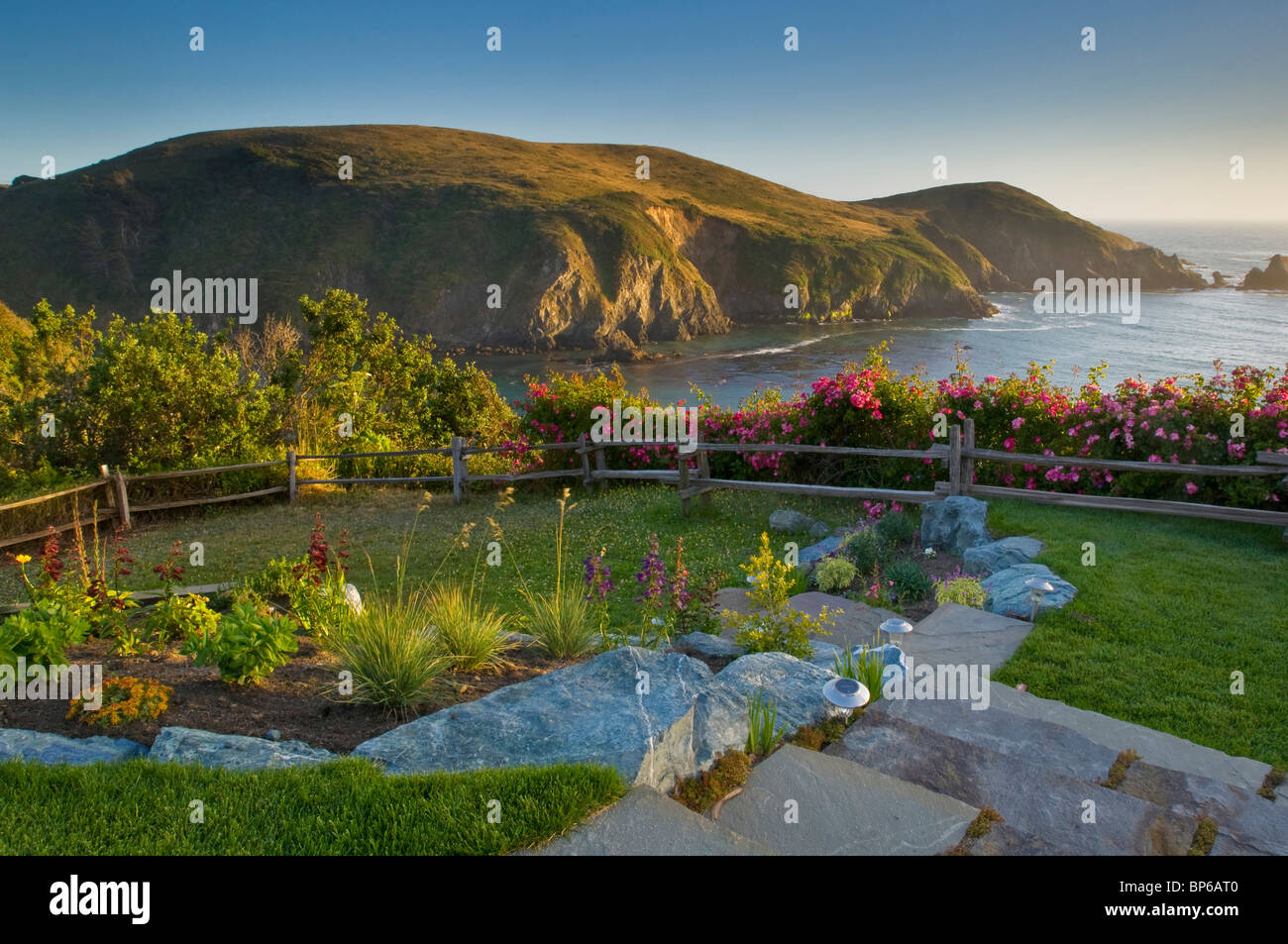 Lawn and garden over looking the ocean at sunset, Albion River Inn, Albion, Mendocino County, California Stock Photo
