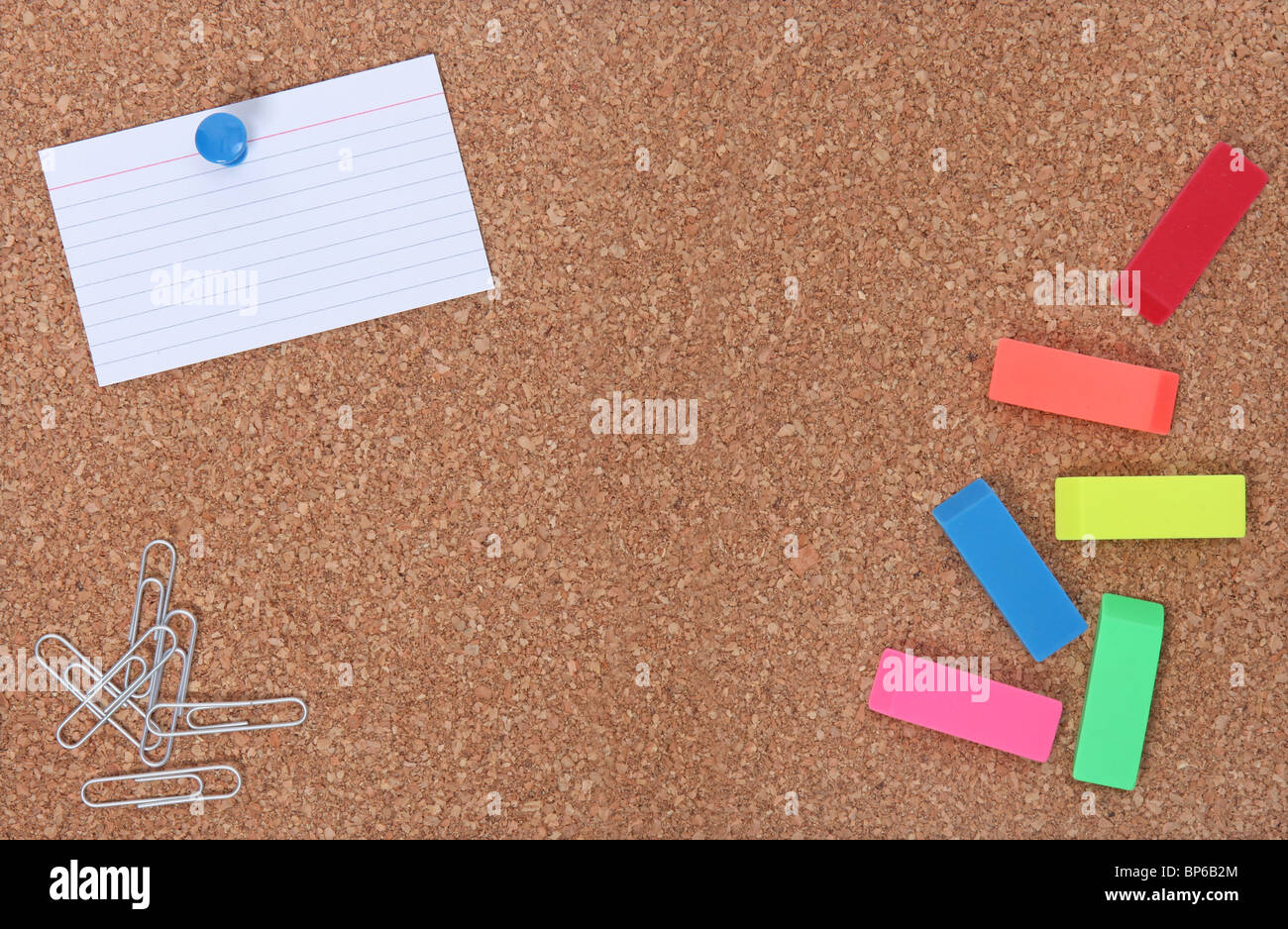 Cork Board With School Supplies and Copy Space for Your Text Stock Photo