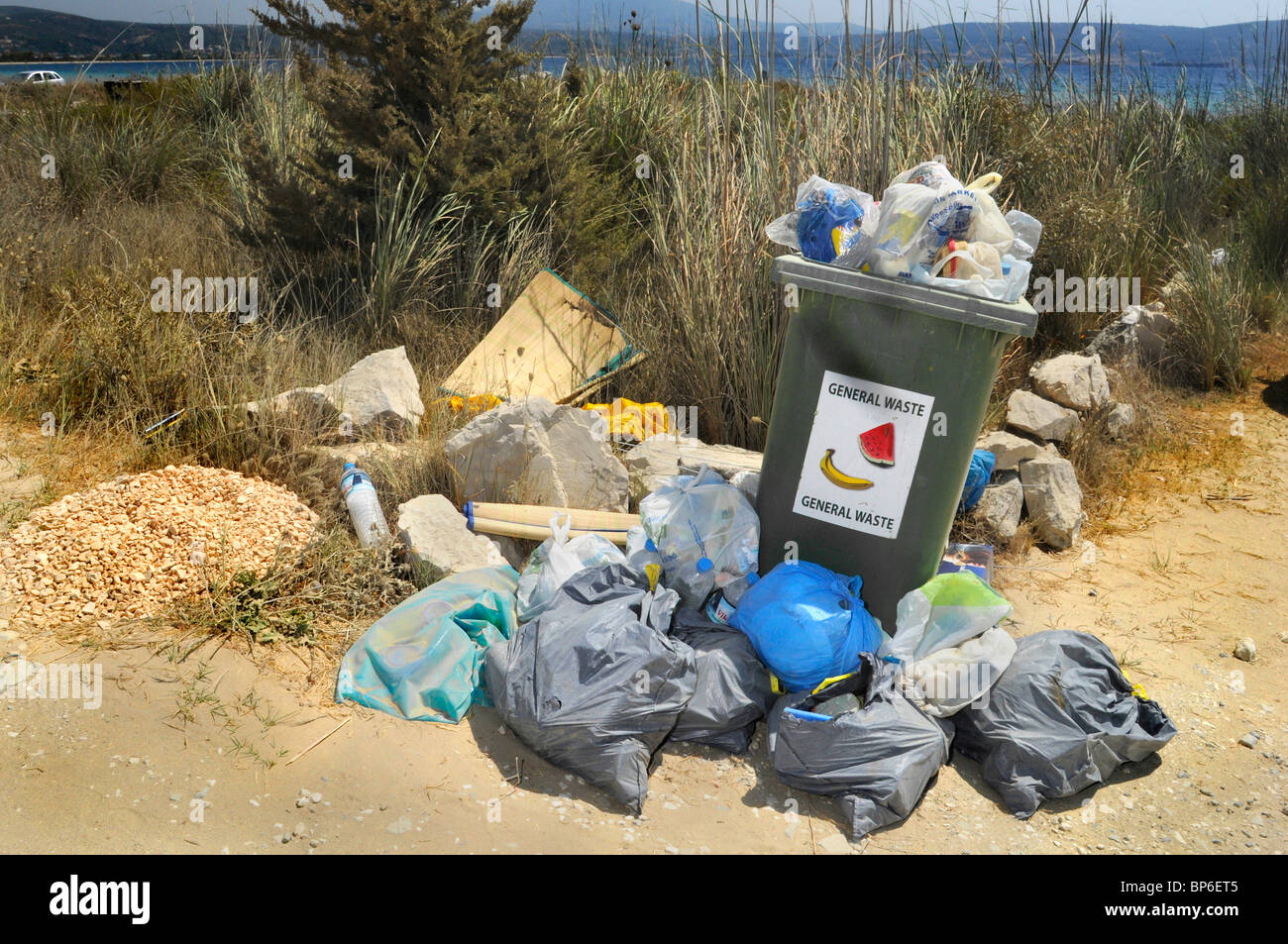 overfilled dustbin in a Natura 2000 nature reserve in Greece, Greece, Peloponnes, Messinien, Pylos Stock Photo