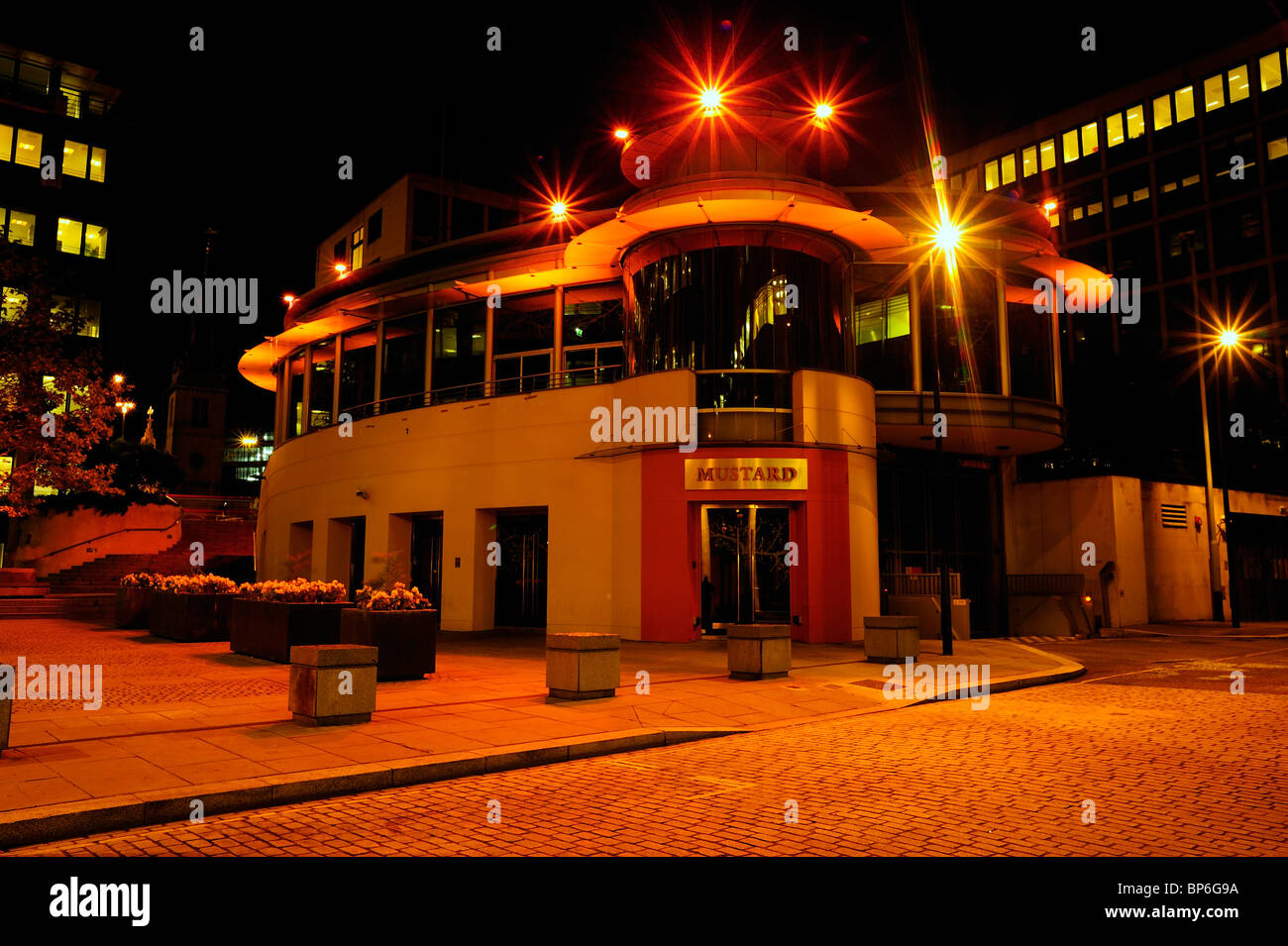 Mustard bar and café in London at night Stock Photo Alamy