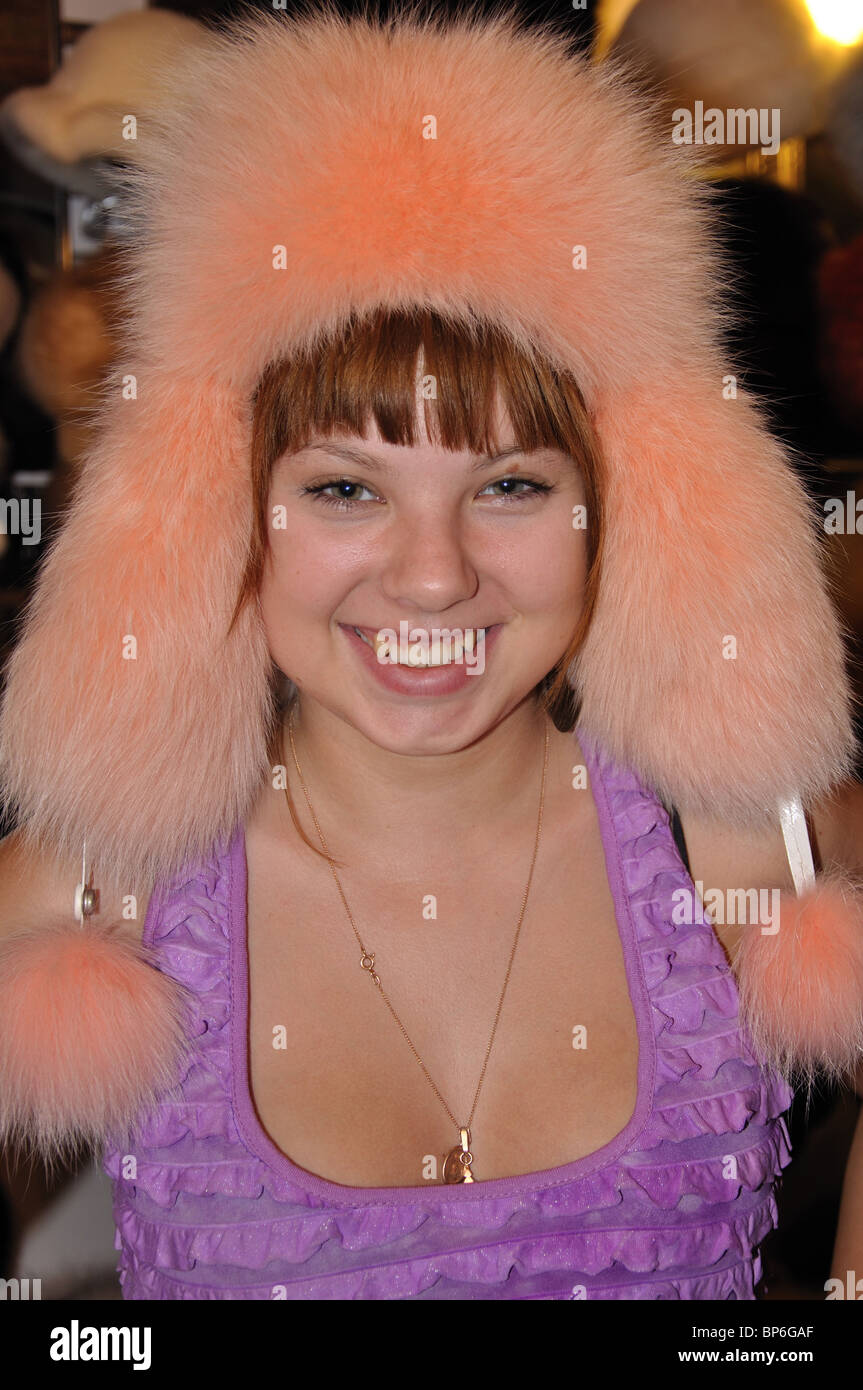 Young Russian woman wearing fur hat, Saint Petersburg, Northwestern Region, Russia Stock Photo