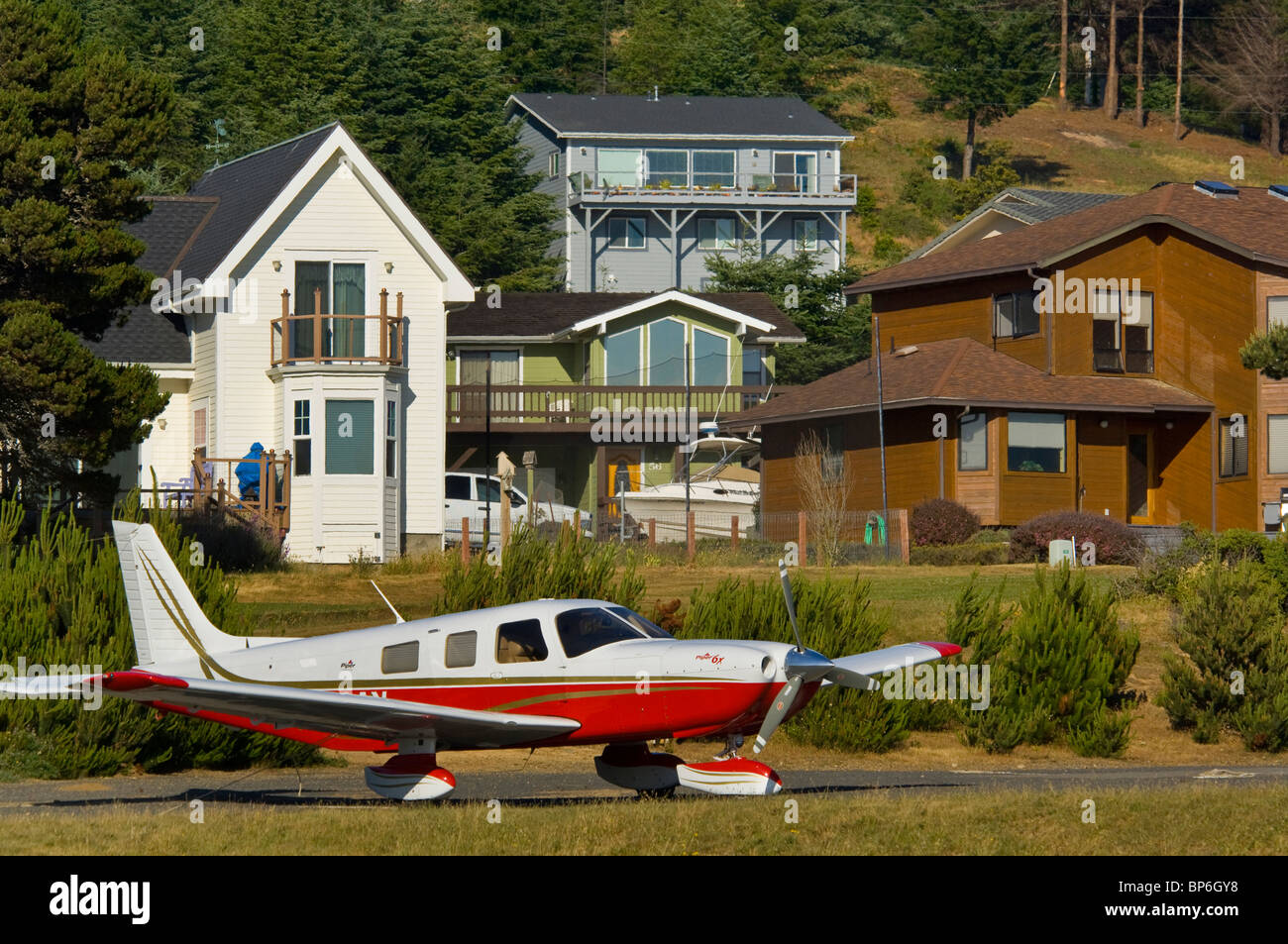 Homes and small private airplane at Shelter Cove, on the Lost Coast, Humboldt County, California Stock Photo