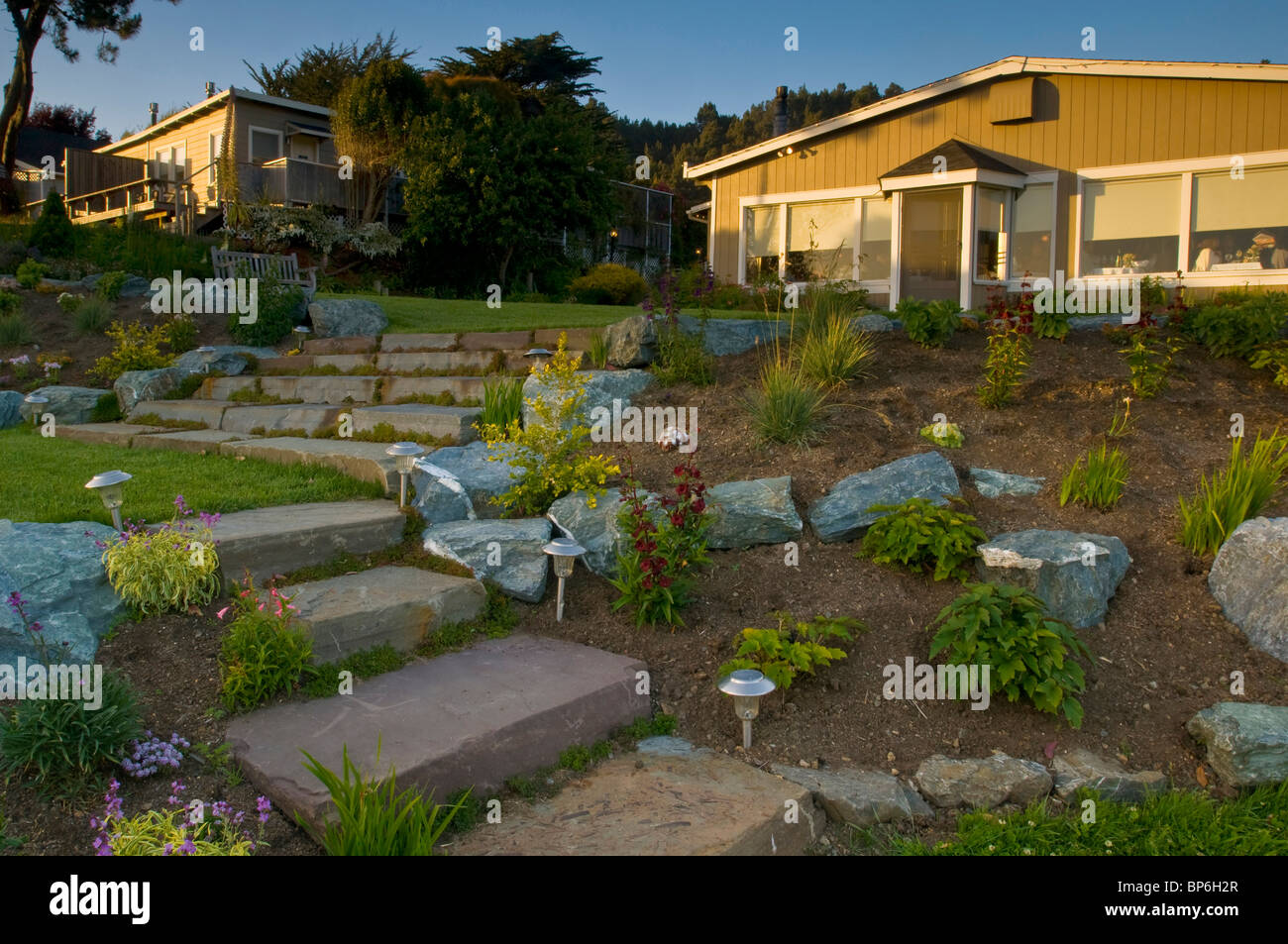 Sunset light on garden and restaurant at the Albion River Inn, Albion, Mendocino County, California Stock Photo