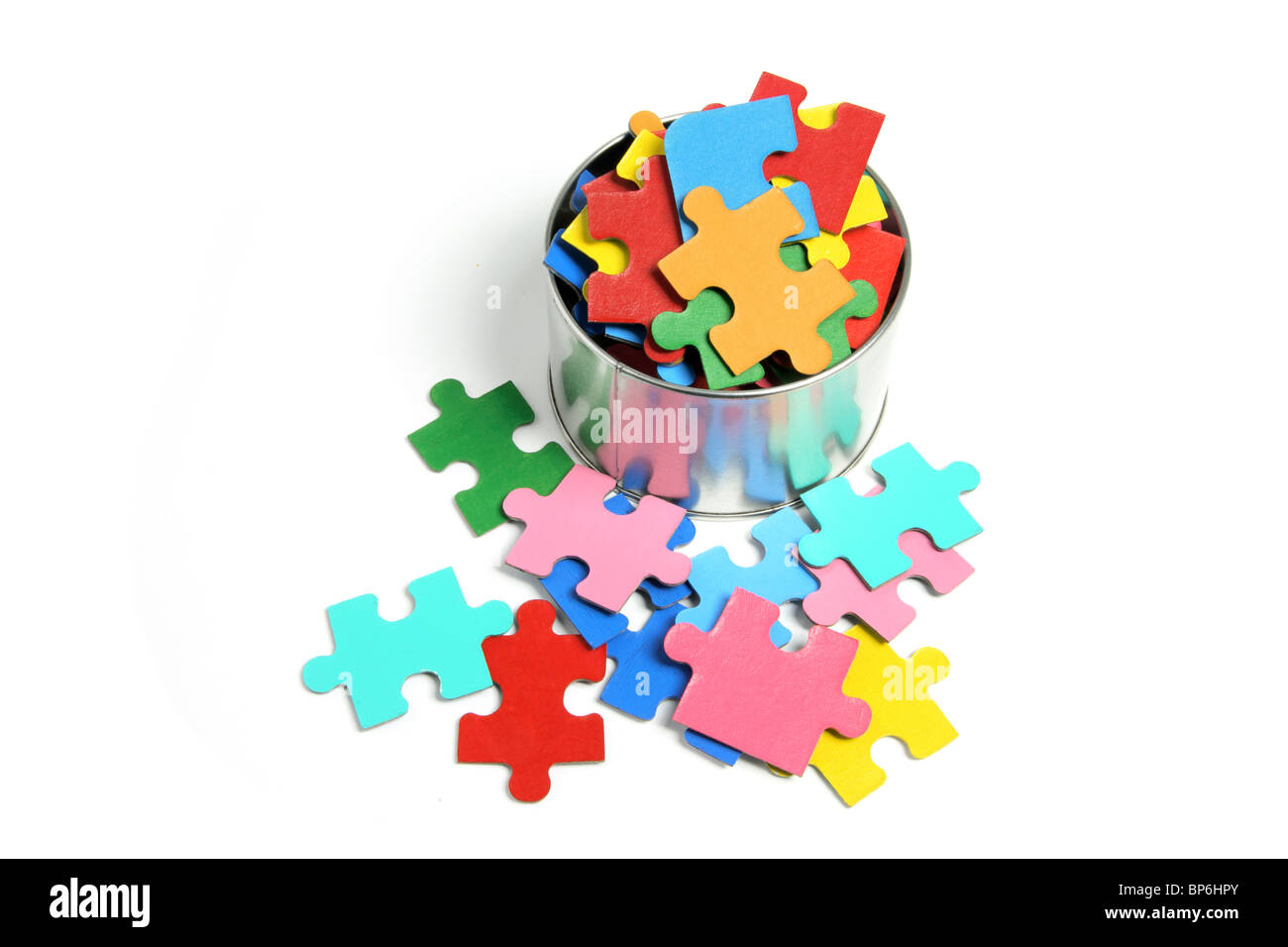 Jigsaw Puzzle Pieces in Tin Can Stock Photo Alamy