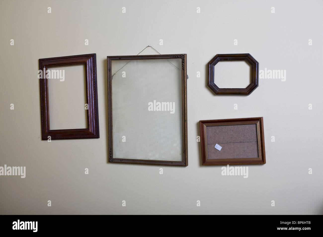 Empty picture frames hanging on a wall Stock Photo Alamy