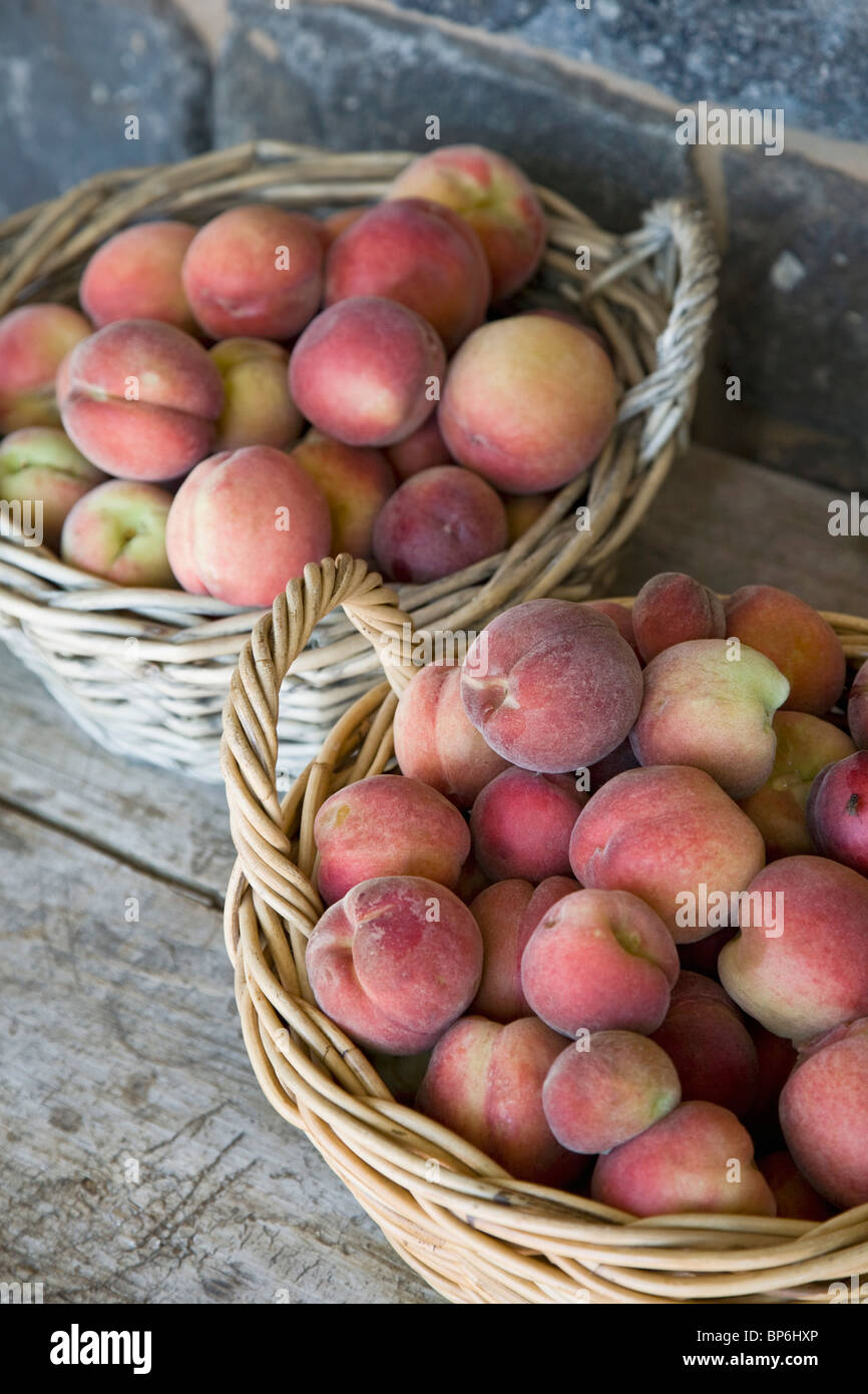 Baskets of peaches Stock Photo Alamy