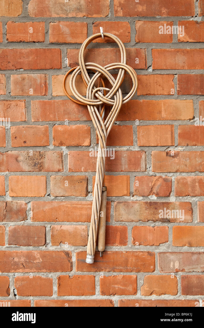 An oldfashioned carpet beater Stock Photo Alamy