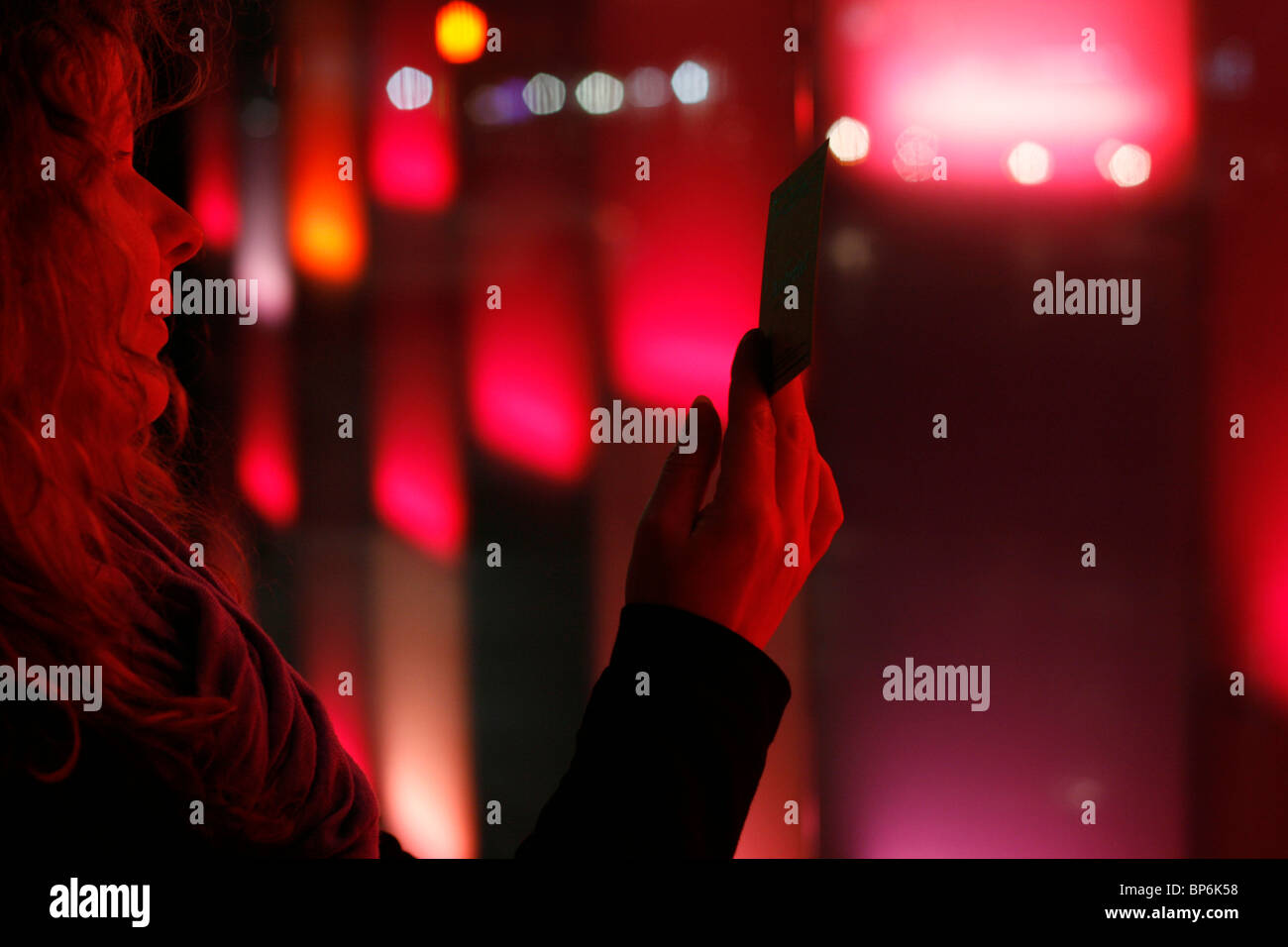 Woman against lights, Los Angeles, California, USA Stock Photo
