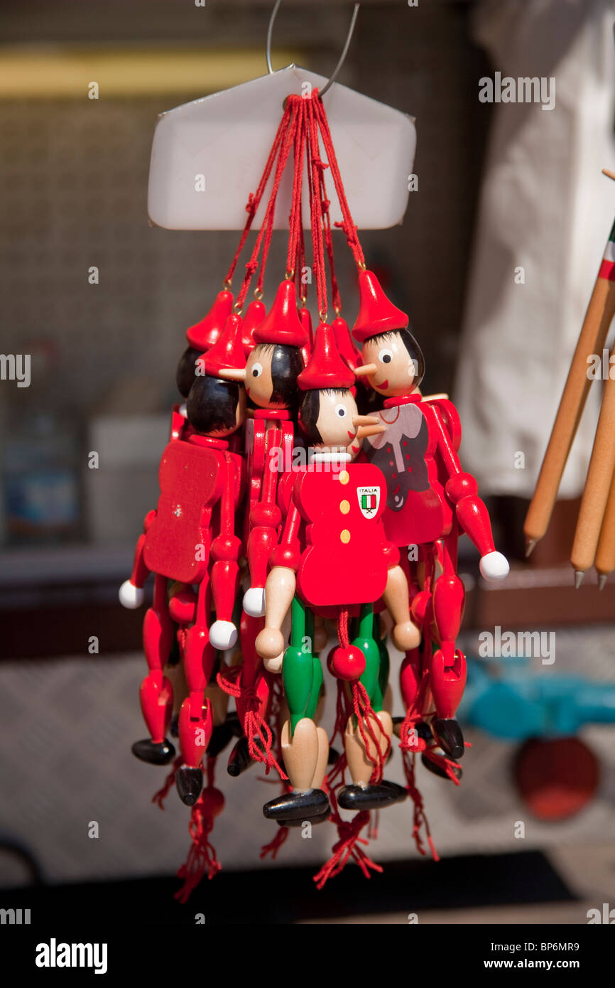 Pinocchio puppets on a string for sale from a stall in Padua, Italy