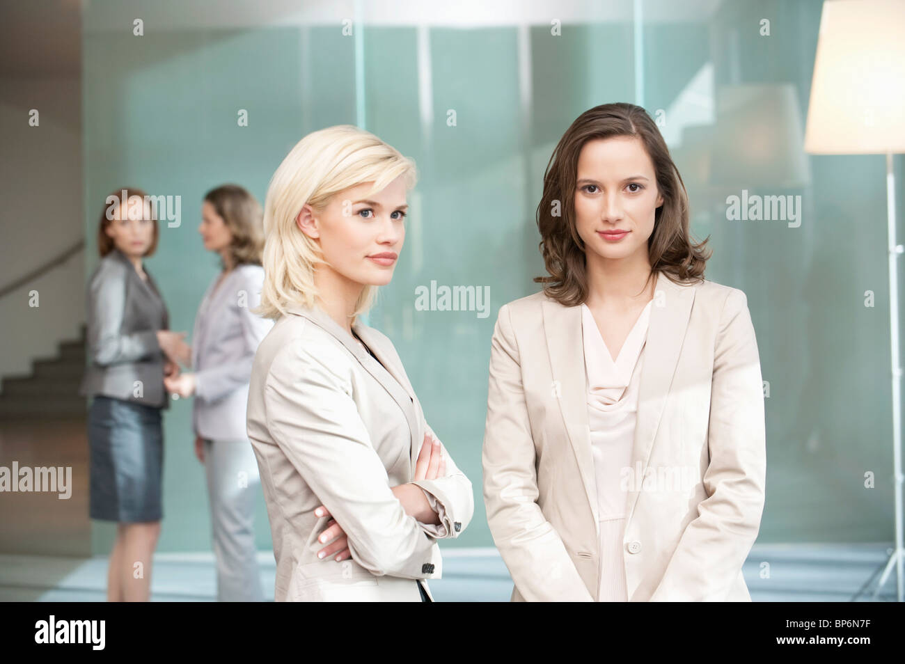 Two women standing together hi-res stock photography and images - Alamy
