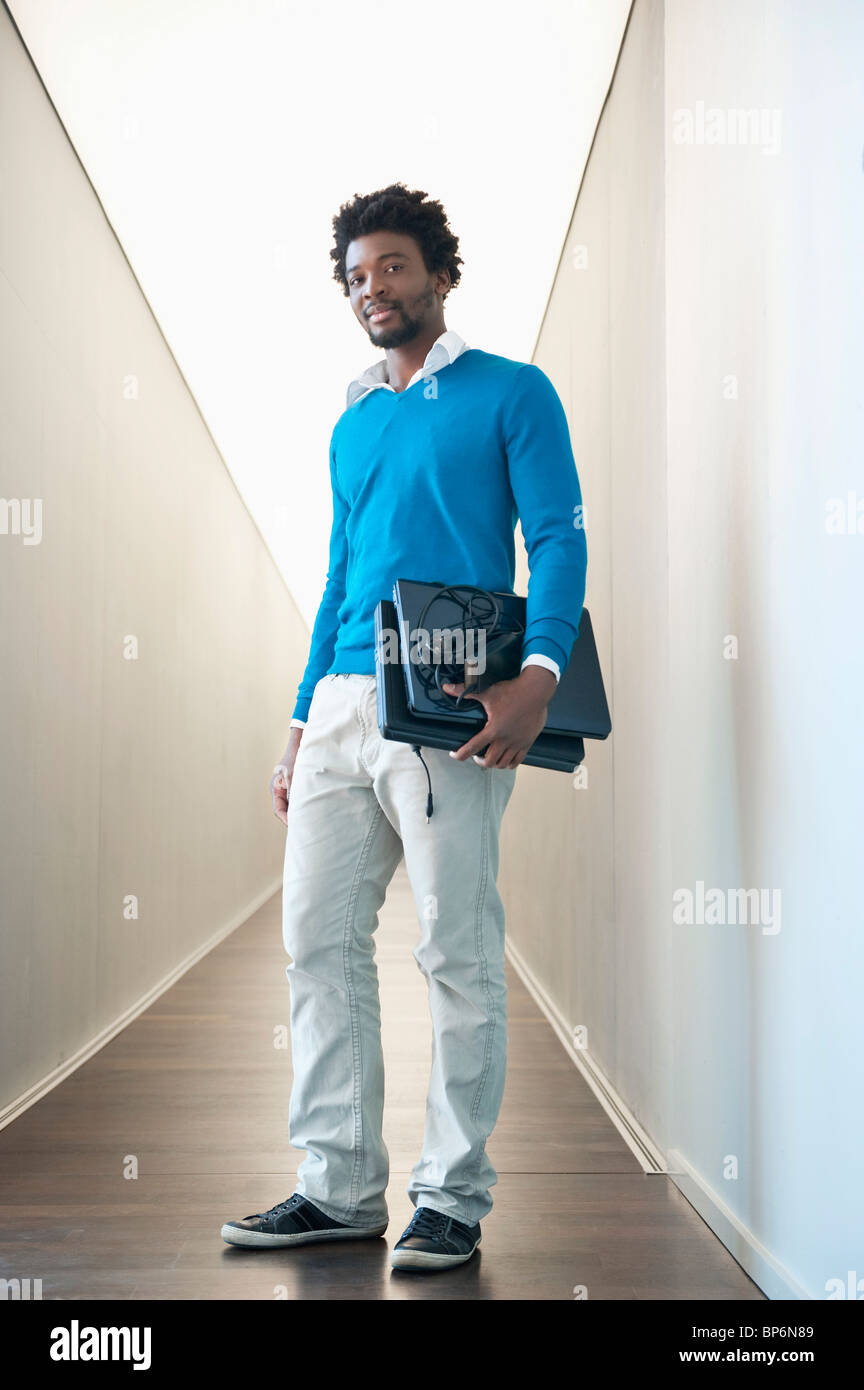 carrying two laptops