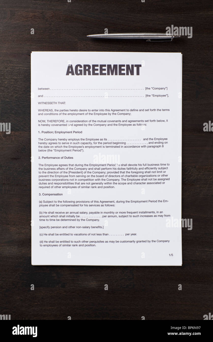 An employment agreement and a pen Stock Photo