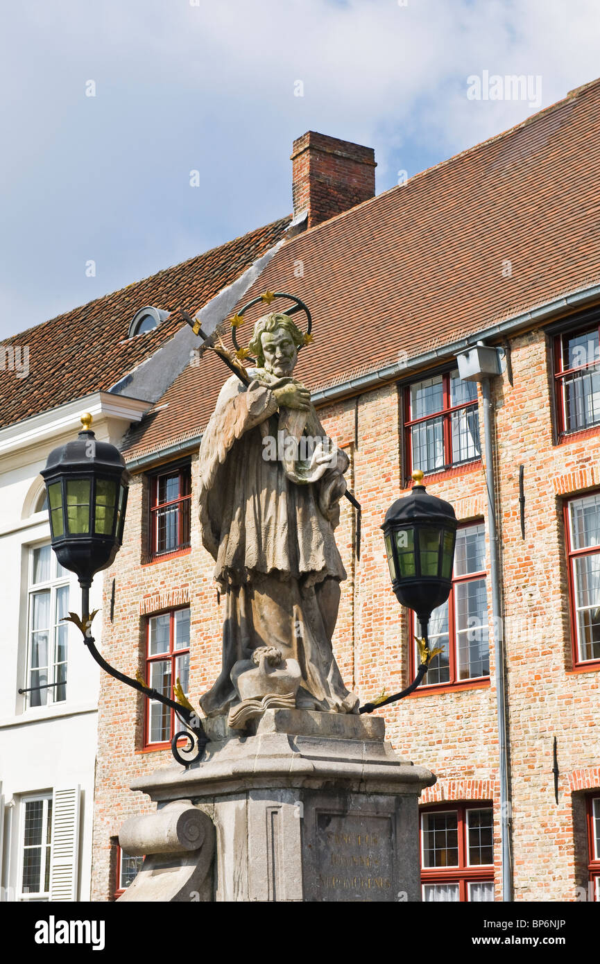 John of Nepomuk or John Nepomucene statue, Historic centre of Bruges, Belgium Stock Photo