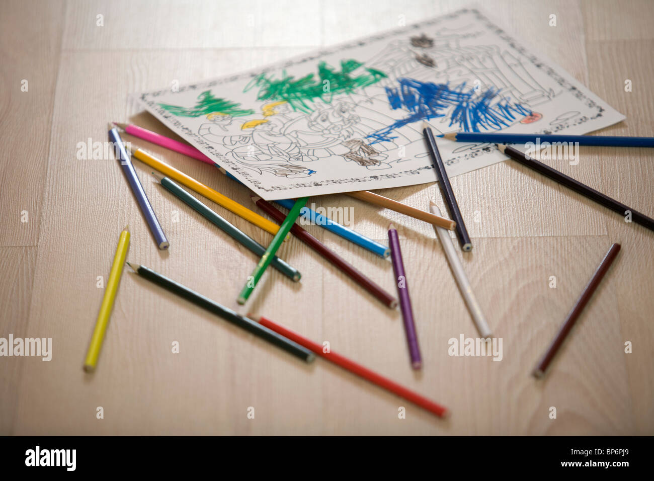 A coloring book page and colored pencils, still life Stock Photo