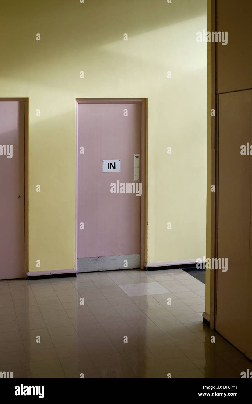 IN sign on a door in a hallway Stock Photo