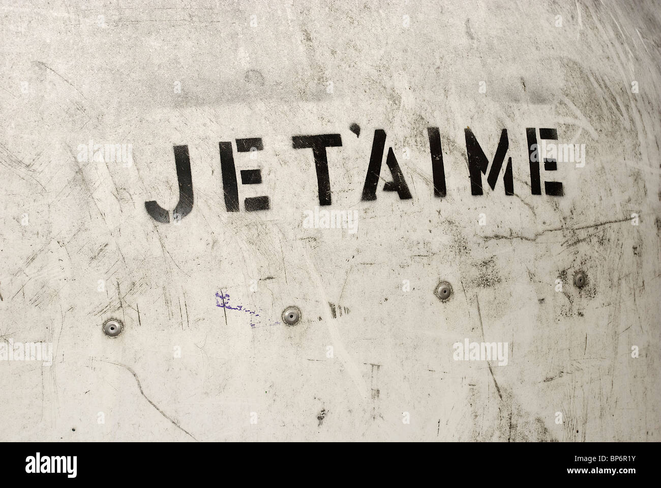 JE T'AIME stenciled on a wall Stock Photo