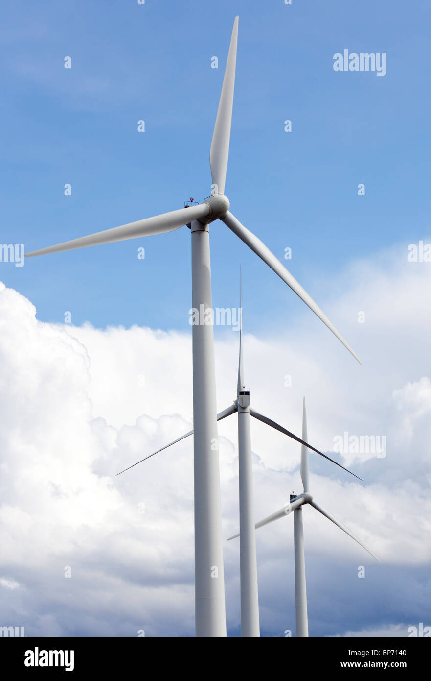 Wind turbines against blue sky and white clouds , Finland Stock Photo ...