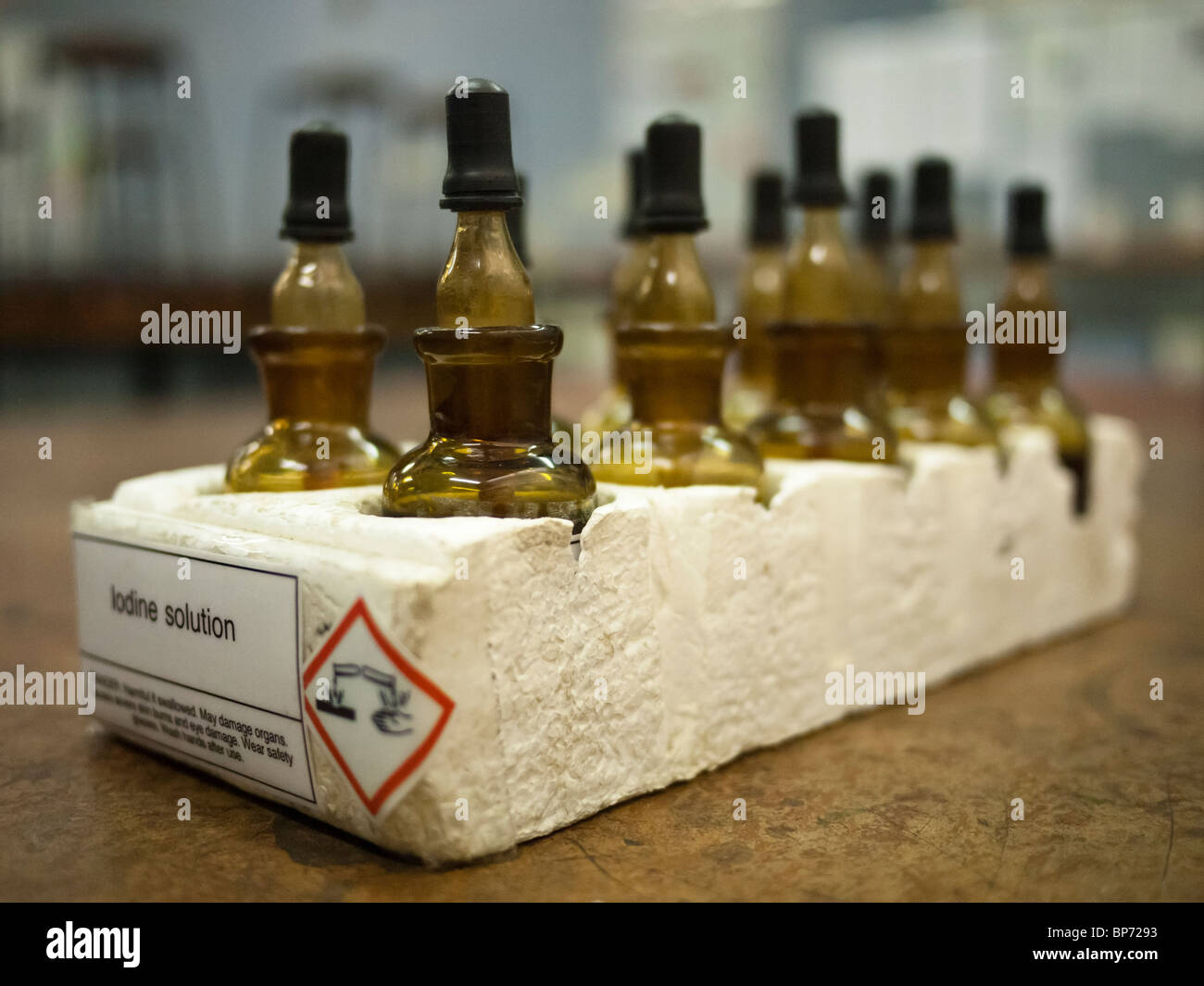 Iodine bottles, class set in polystyrene holder in school science laboratory Stock Photo