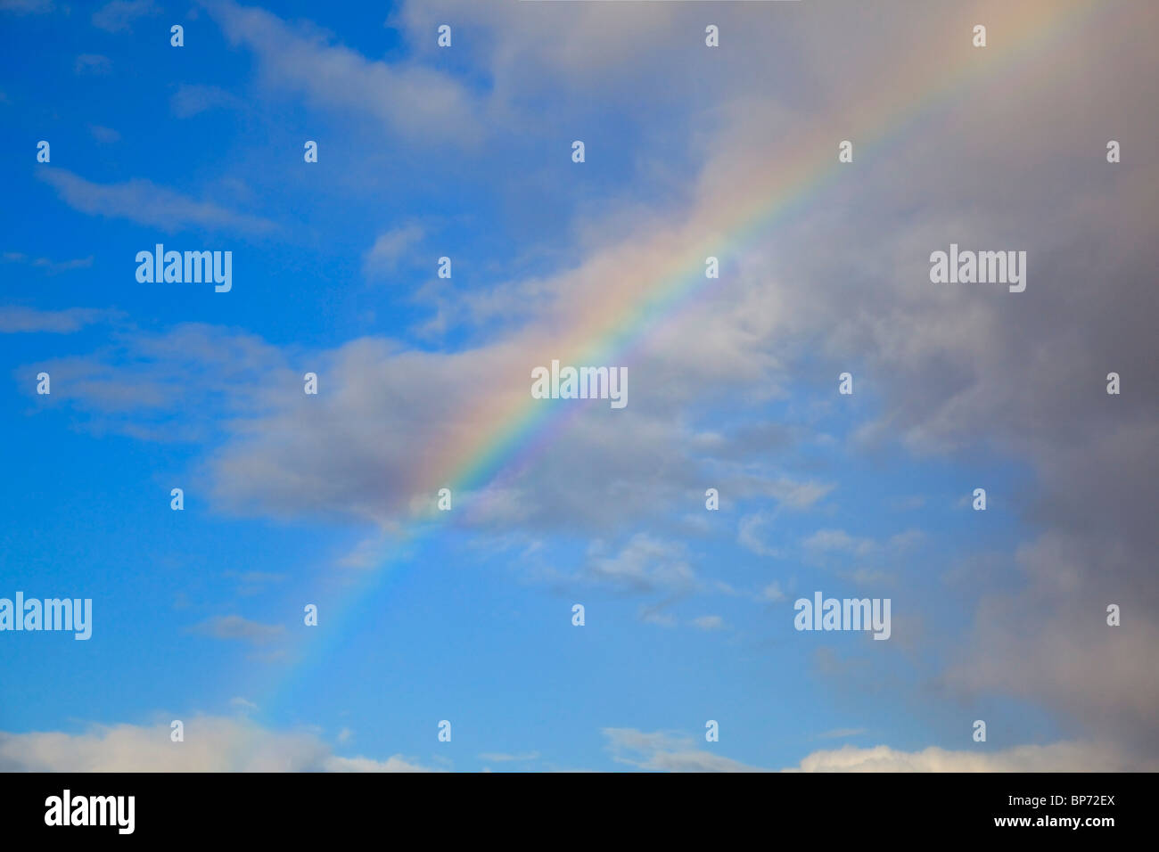 Portland, Oregon, United States Of America; A Rainbow Through The Clouds Stock Photo