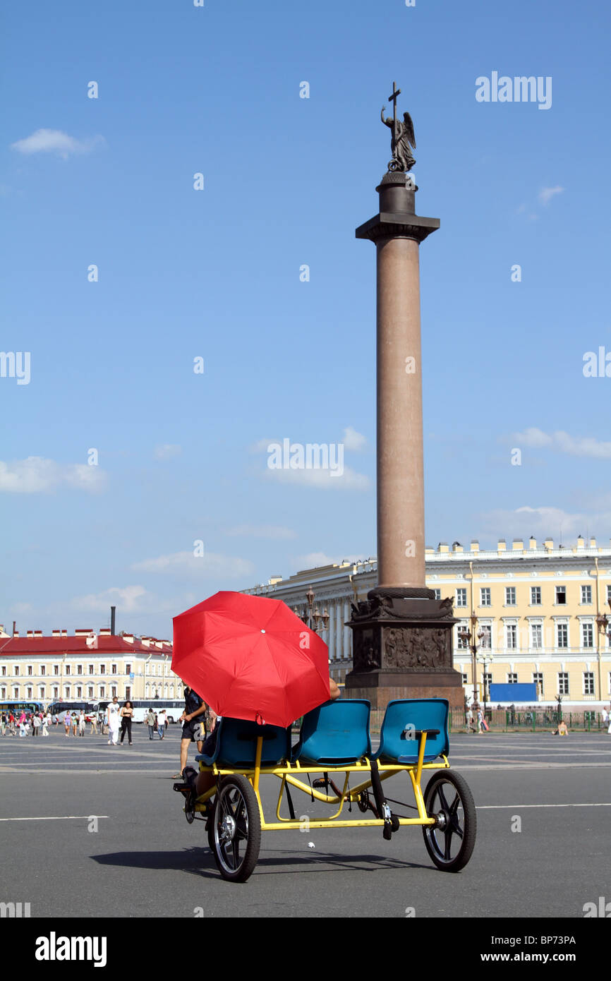 The Alexander Column in Palace Square and a tourist buggy in St. Petersburg, Russia Stock Photo