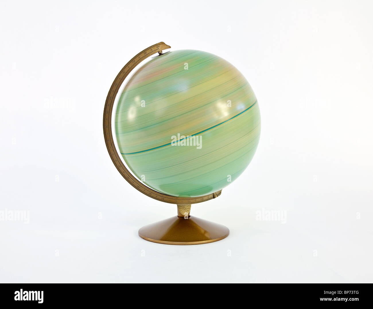 Fast spinning vintage globe of the world. Stock Photo