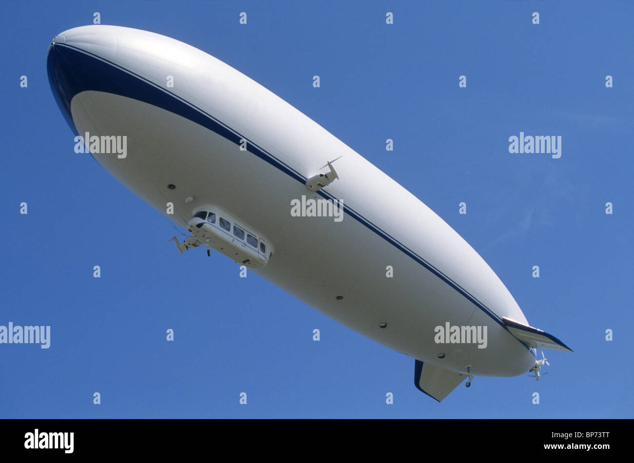 Airship dirigible Zeppelin NT floating in blue sky near Friedrichshafen, Baden-Württemberg, Germany Stock Photo
