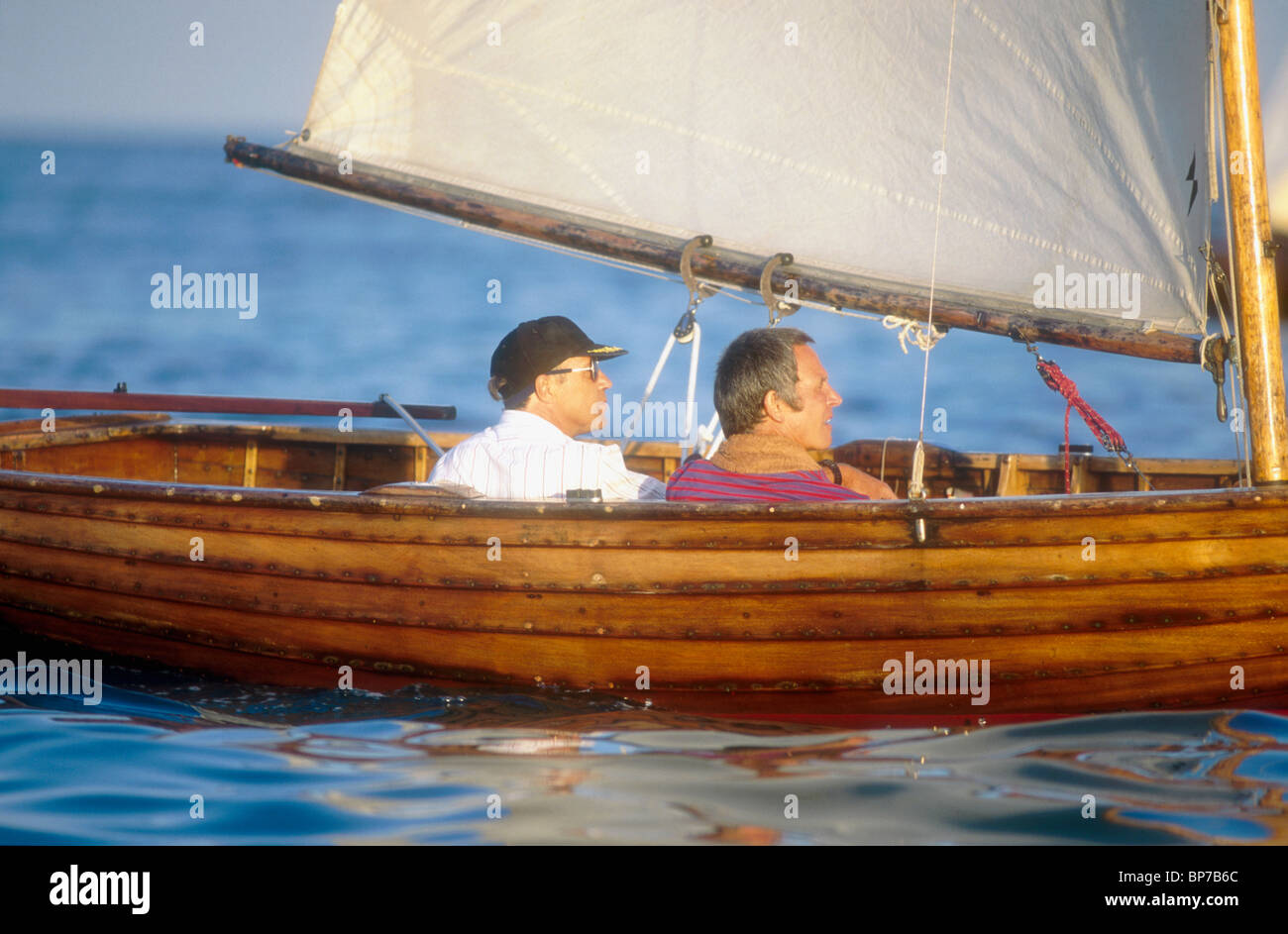 Men sailing wooden dinghy clinker eve hires stock photography and