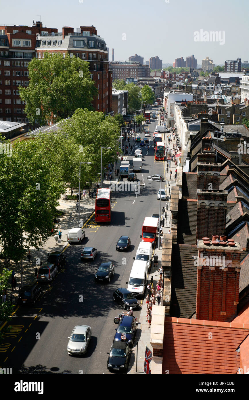 Roofline view of traffic moving along King's Road, Chelsea, London, UK Stock Photo