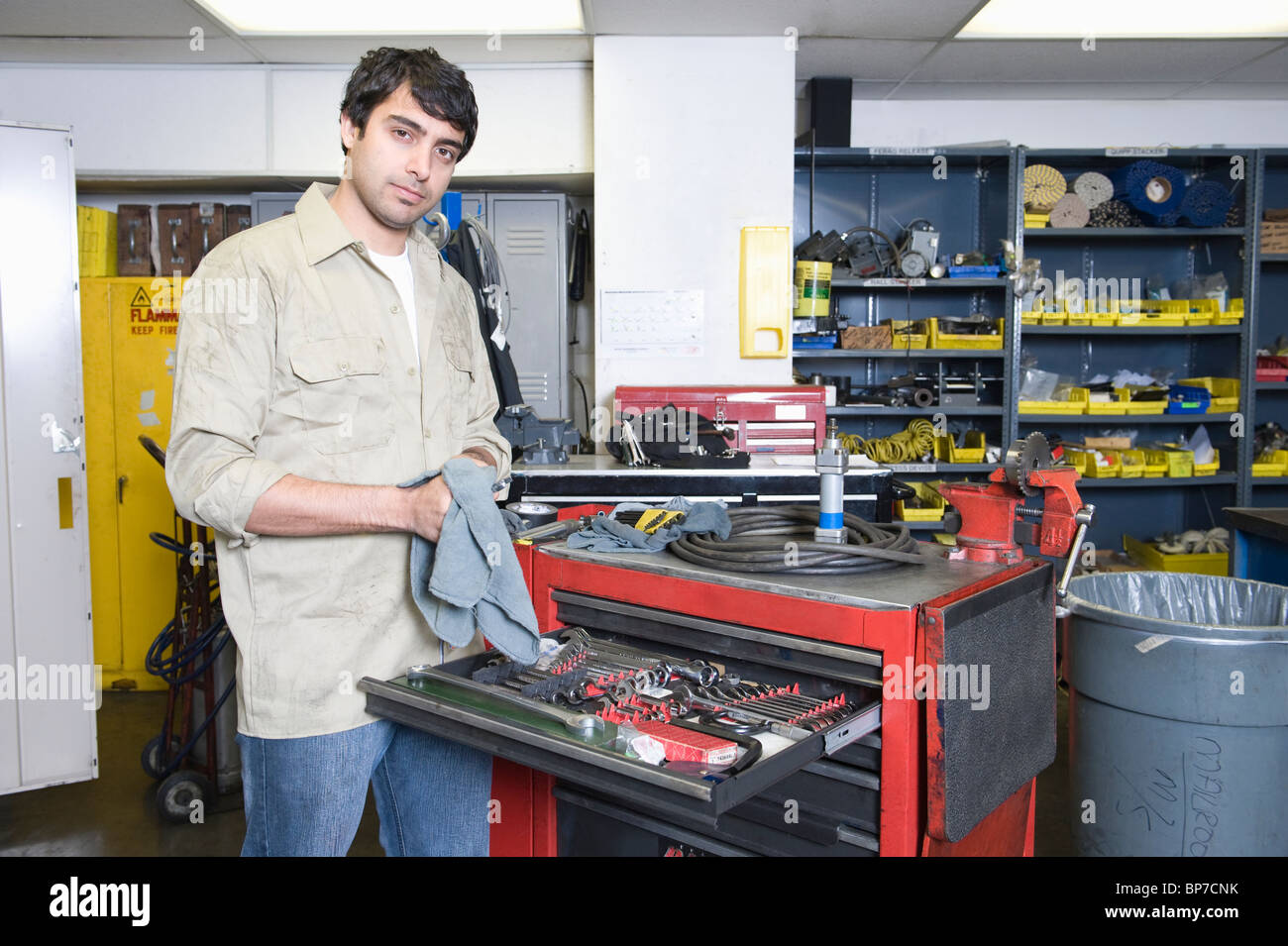 Man in workshop with tools Stock Photo - Alamy
