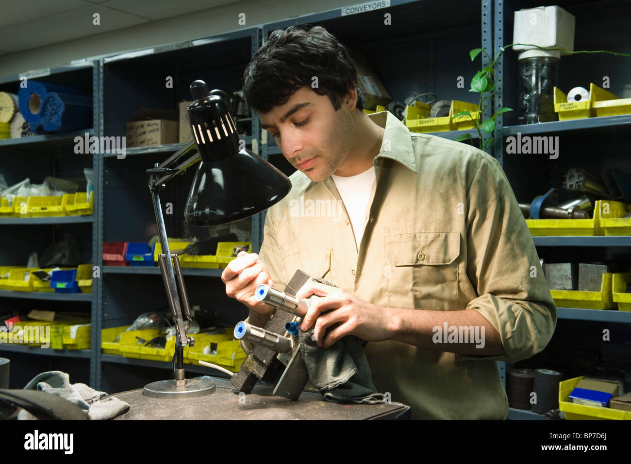 Man in workshop with tools Stock Photo - Alamy