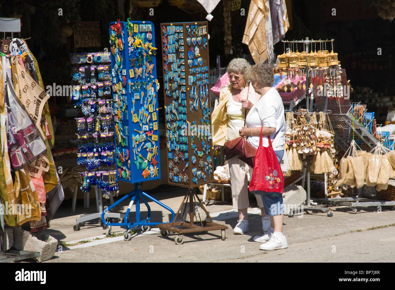 Tourist shops selling souvenirs in the mountain village of Makrades on the Greek Mediterranean island of Corfu Greece GR Stock Photo